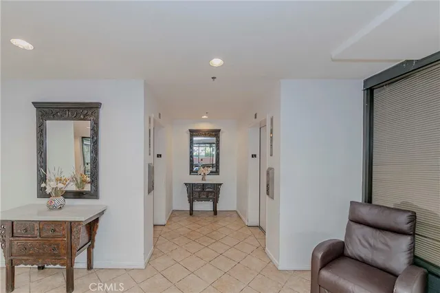 a view of entryway with washer and dryer
