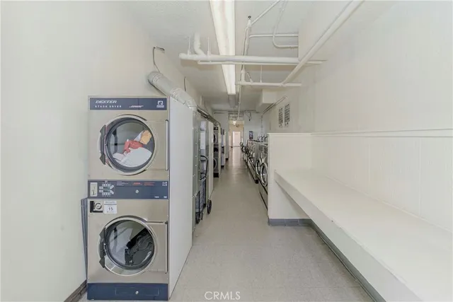 a view of a storage & utility room with washer and dryer