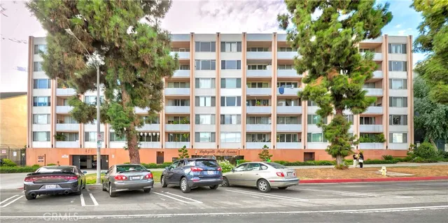 a city street lined with buildings and trees