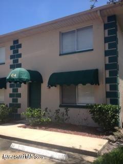 1880 Murrell Road, Unit 64 Rockledge, FL 32955 - Photo 1 of 1 a view of a house with a yard