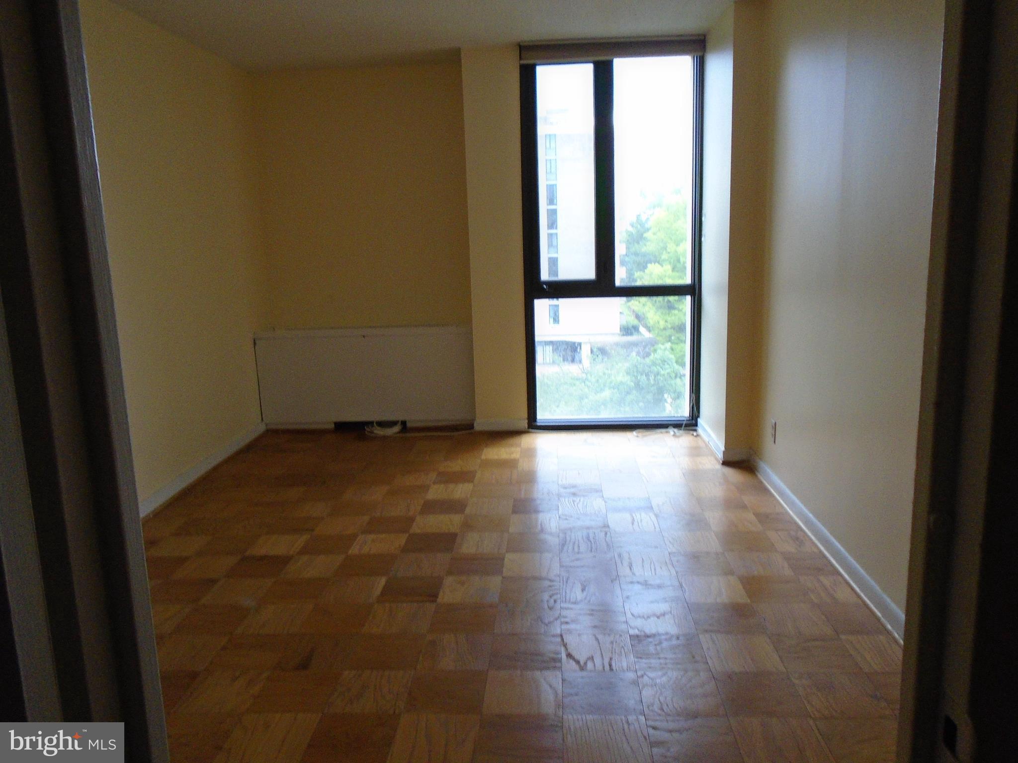 1250 4th Street Southwest, Unit W403 Washington, DC 20024 - Photo 20 of 41 a view of an empty room with a window