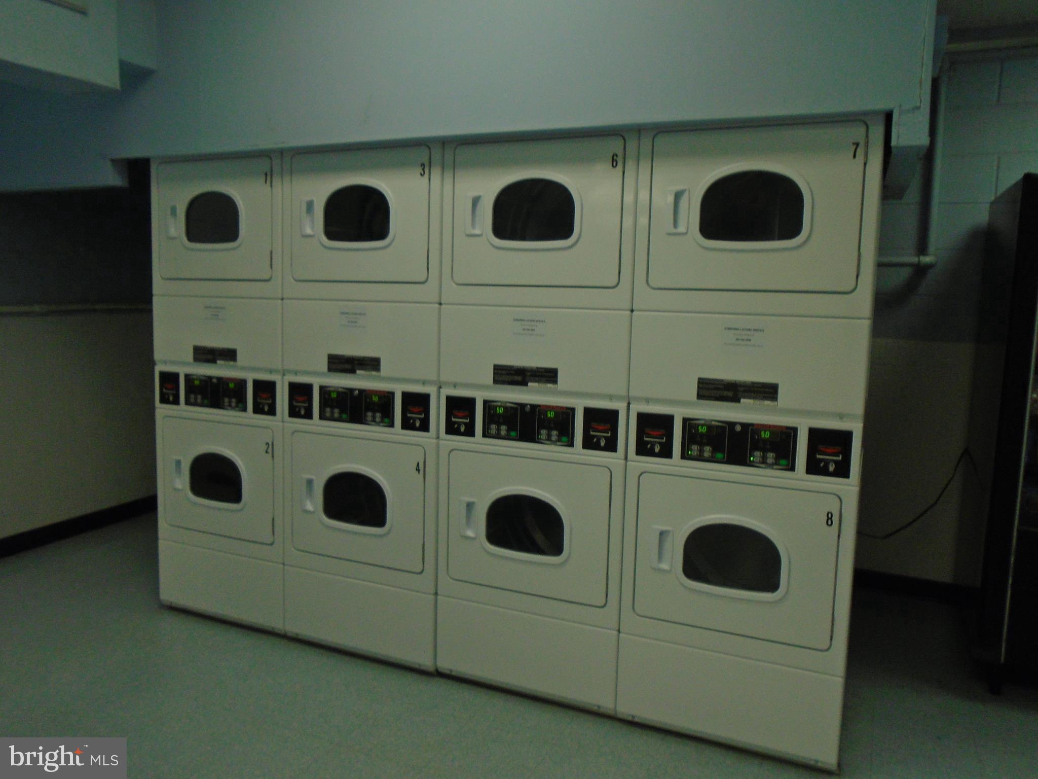 1250 4th Street Southwest, Unit W403 Washington, DC 20024 - Photo 31 of 41 a utility room with dryer and washer