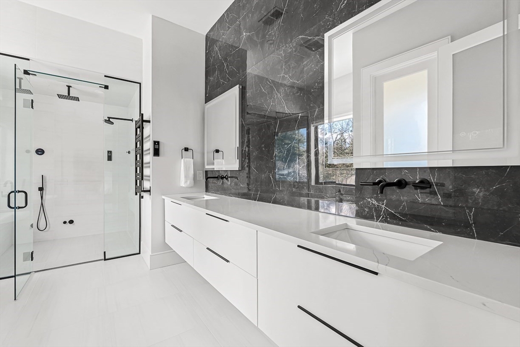 180 Allen Avenue Newton, MA 02468 - Photo 17 of 36 a bathroom with a sink and a mirror