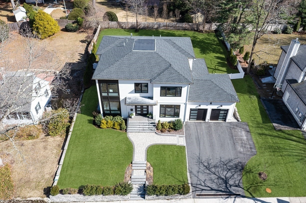 180 Allen Avenue Newton, MA 02468 - Photo 2 of 36 an aerial view of a house with yard patio and swimming pool