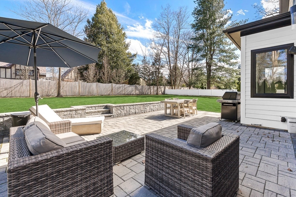 180 Allen Avenue Newton, MA 02468 - Photo 33 of 36 a view of backyard with swimming pool and outdoor seating
