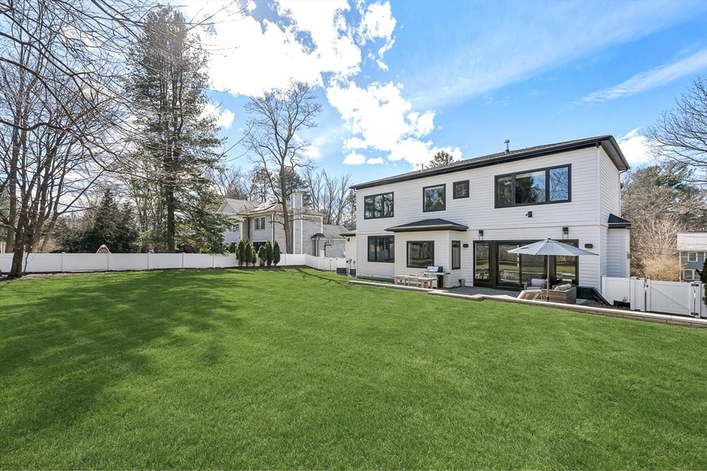180 Allen Avenue Newton, MA 02468 - Photo 34 of 36 a view of a house with a yard porch and sitting area