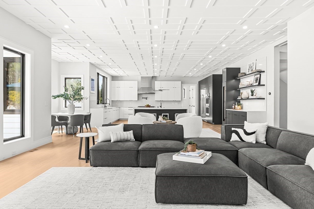 180 Allen Avenue Newton, MA 02468 - Photo 10 of 36 a living room with furniture and a large window