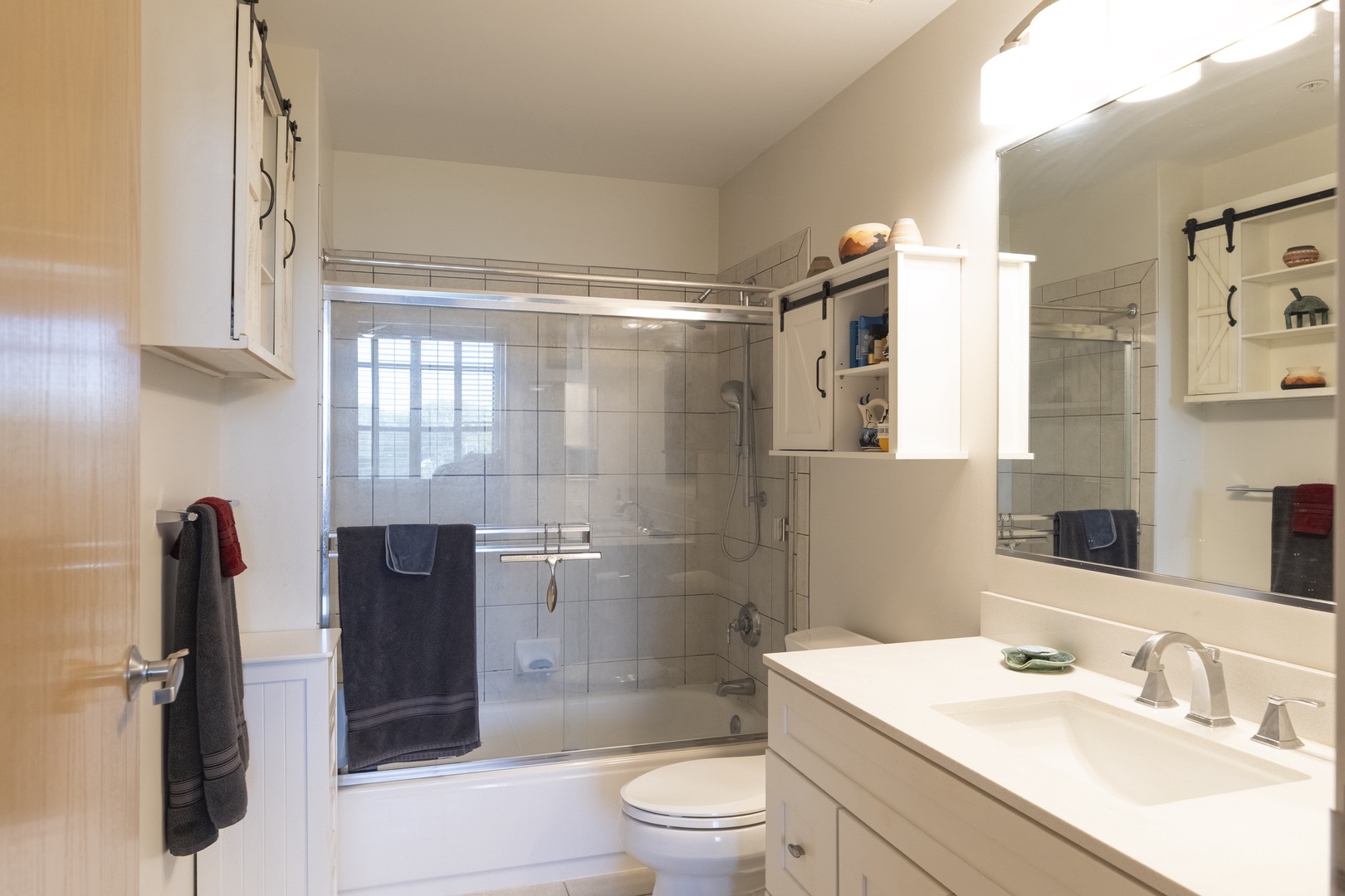 1 South Highland Avenue, Unit 400 Arlington Heights, IL 60005 - Photo 11 of 24 a bathroom with a sink a toilet and shower