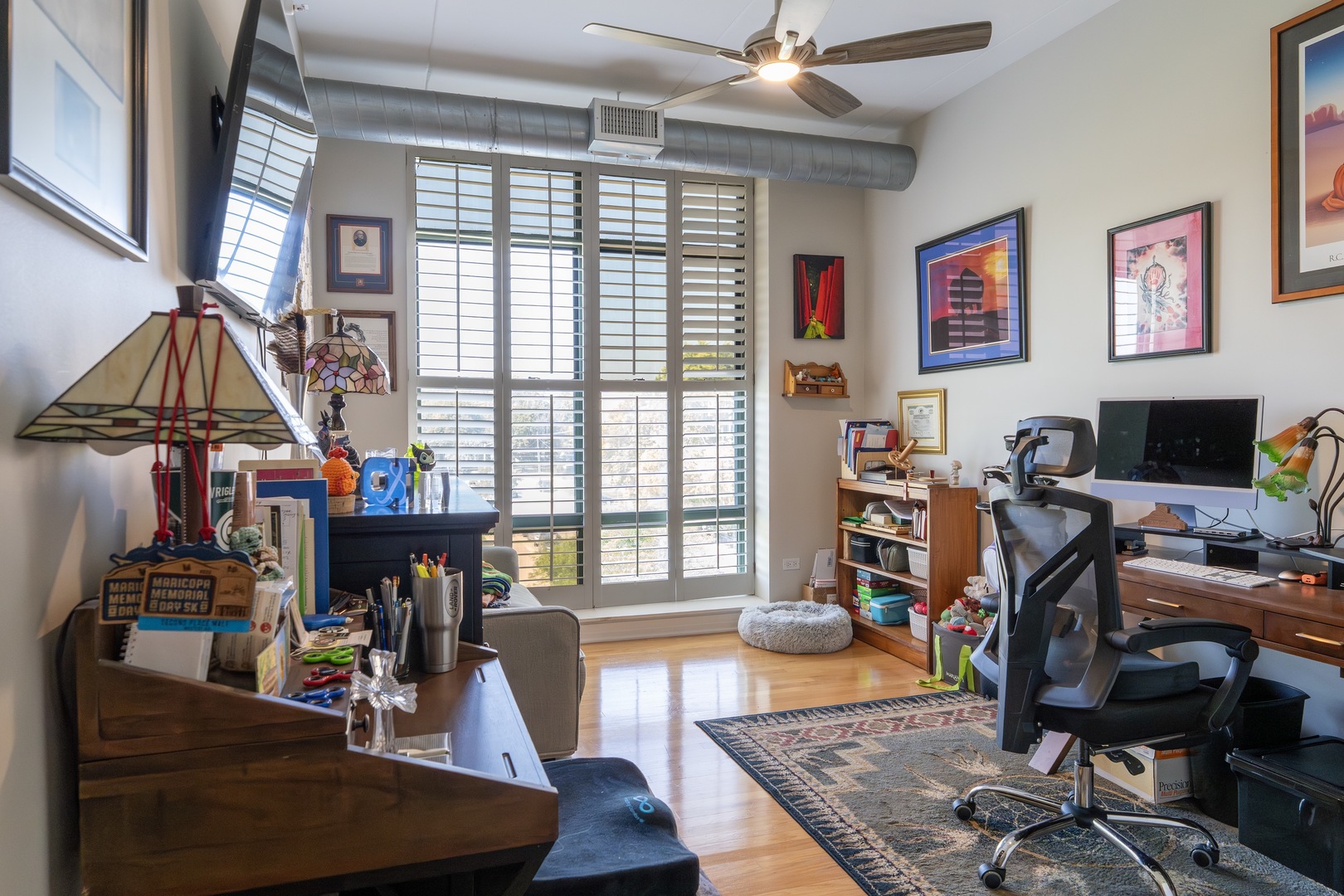 1 South Highland Avenue, Unit 400 Arlington Heights, IL 60005 - Photo 12 of 24 a view of a livingroom with workspace and a window