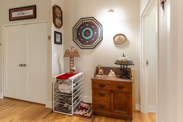 a view of storage and utility room with a window