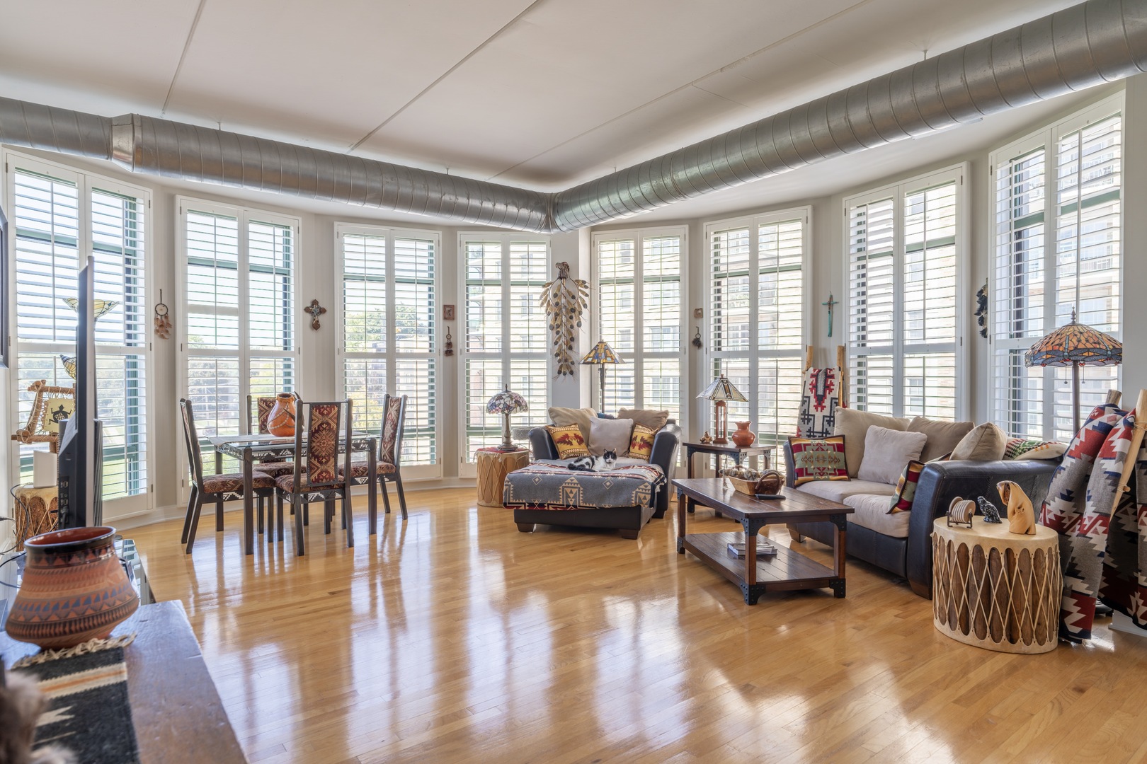 1 South Highland Avenue, Unit 400 Arlington Heights, IL 60005 - Photo 2 of 24 a living room with furniture and floor to ceiling windows