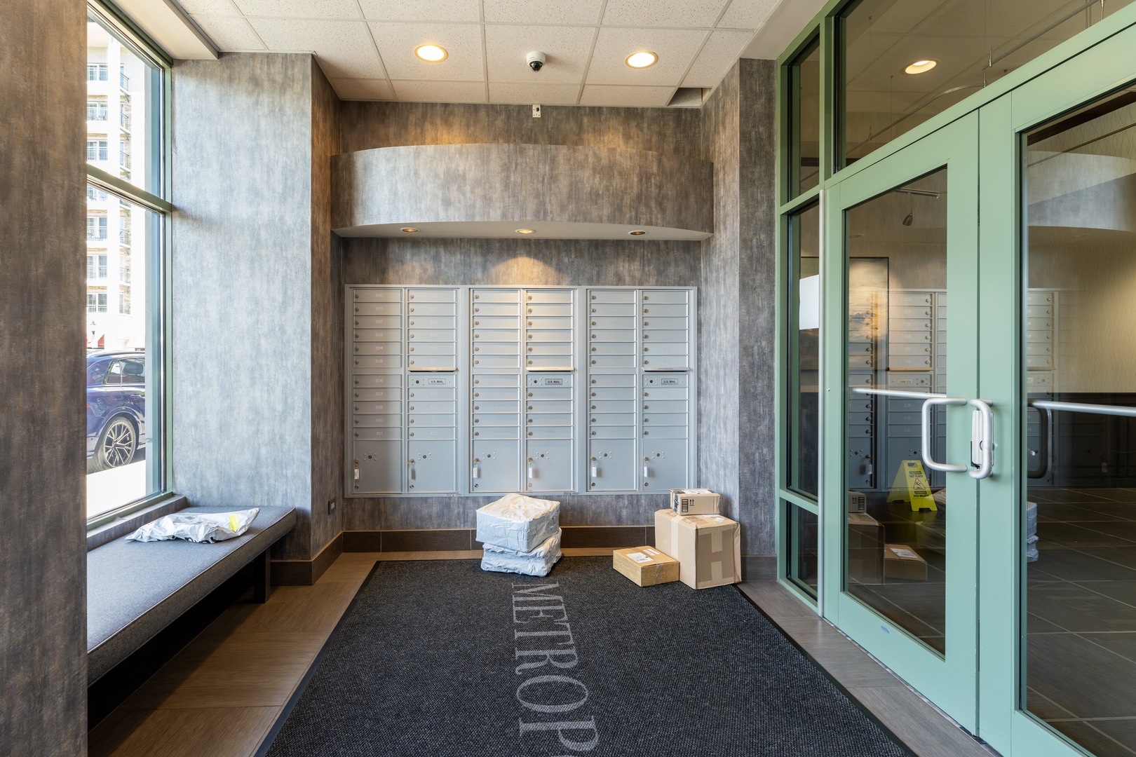 1 South Highland Avenue, Unit 400 Arlington Heights, IL 60005 - Photo 22 of 24 a view of kitchen with granite countertop a couch and a large window