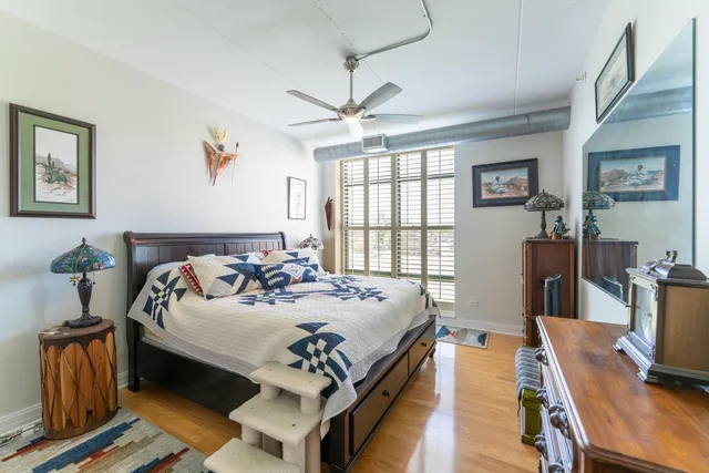 a bedroom with furniture and a window