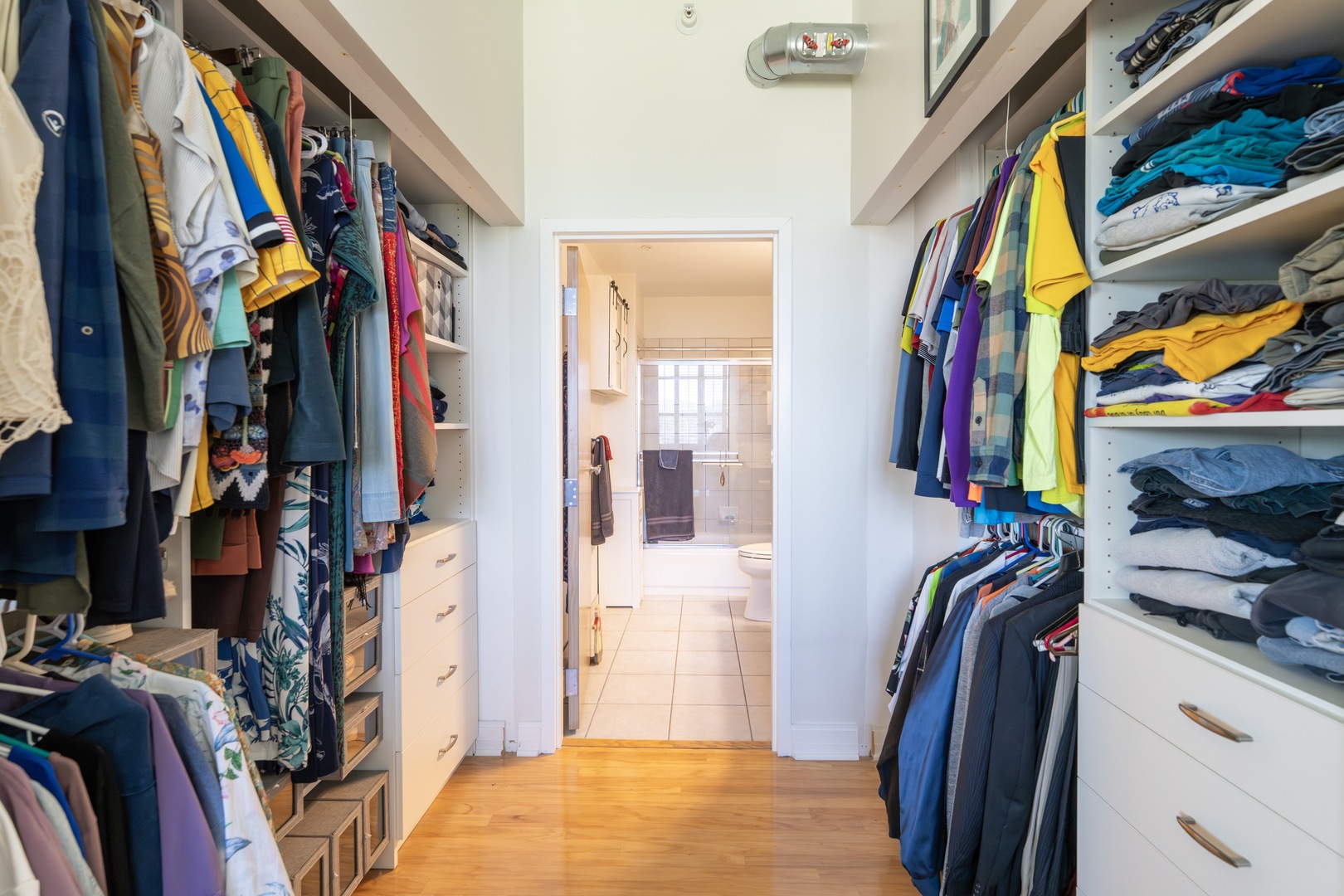 1 South Highland Avenue, Unit 400 Arlington Heights, IL 60005 - Photo 10 of 24 a view of walk in closet with clothes and shoes