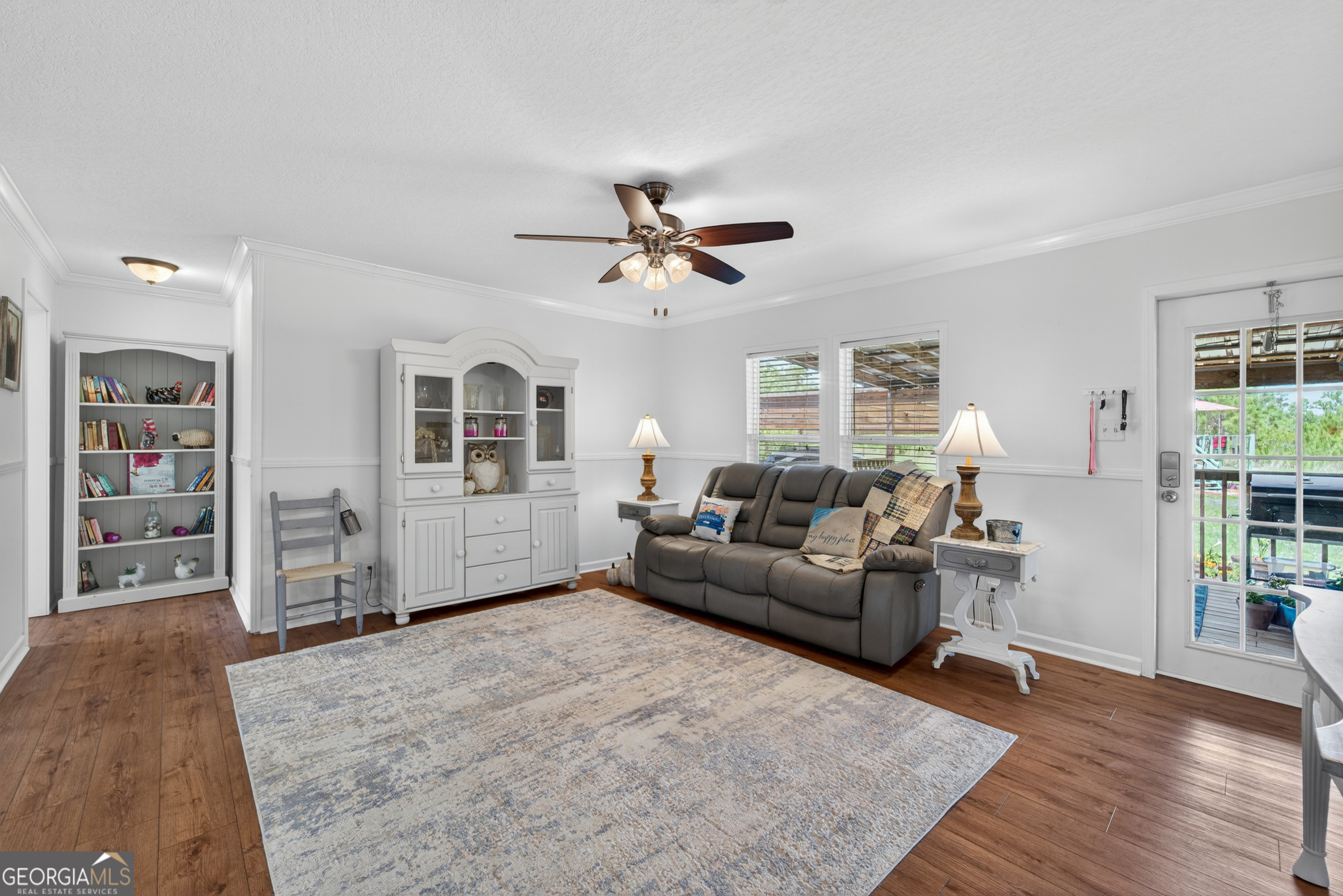 1953 Raybon Road West Hoboken, GA 31542 - Photo 12 of 31 a living room with furniture and wooden floor
