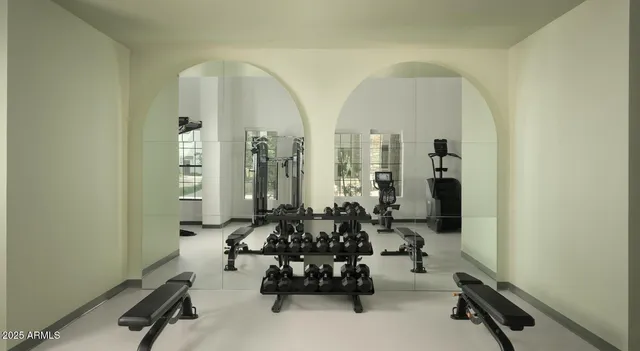 a view of gym equipment with windows