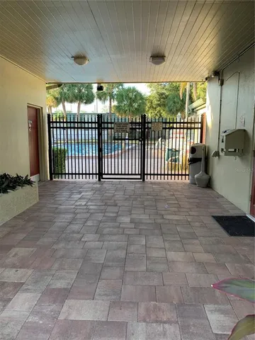 a view of a building with sitting area