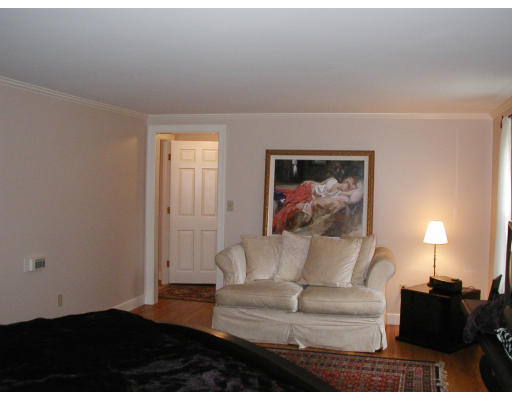 17 Round Hill Road Weston, MA 02493 - Photo 16 of 17 a living room with furniture and a painting on the wall