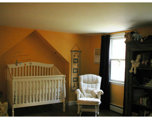 17 Round Hill Road Weston, MA 02493 - Photo 6 of 17 a living room with furniture and a window