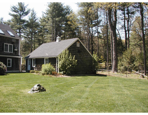 17 Round Hill Road Weston, MA 02493 - Photo 10 of 17 a front view of a house with a yard