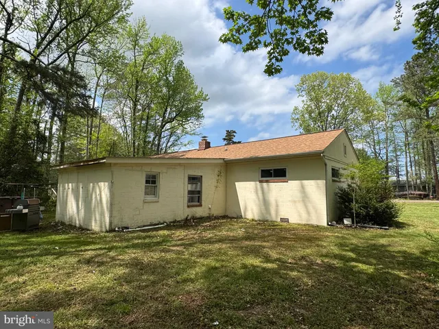 a view of outdoor space with wooden fence