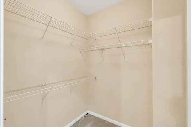 a view of a building with a yard