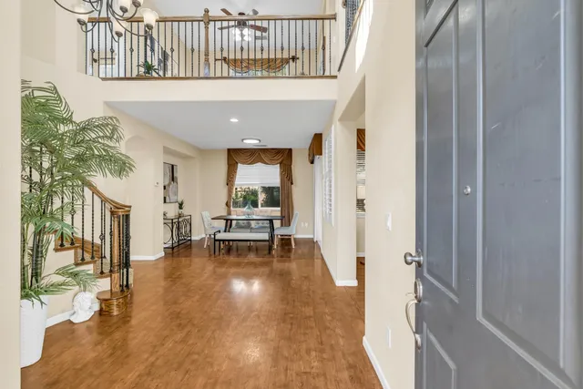 a view of entryway with wooden floor and a rug