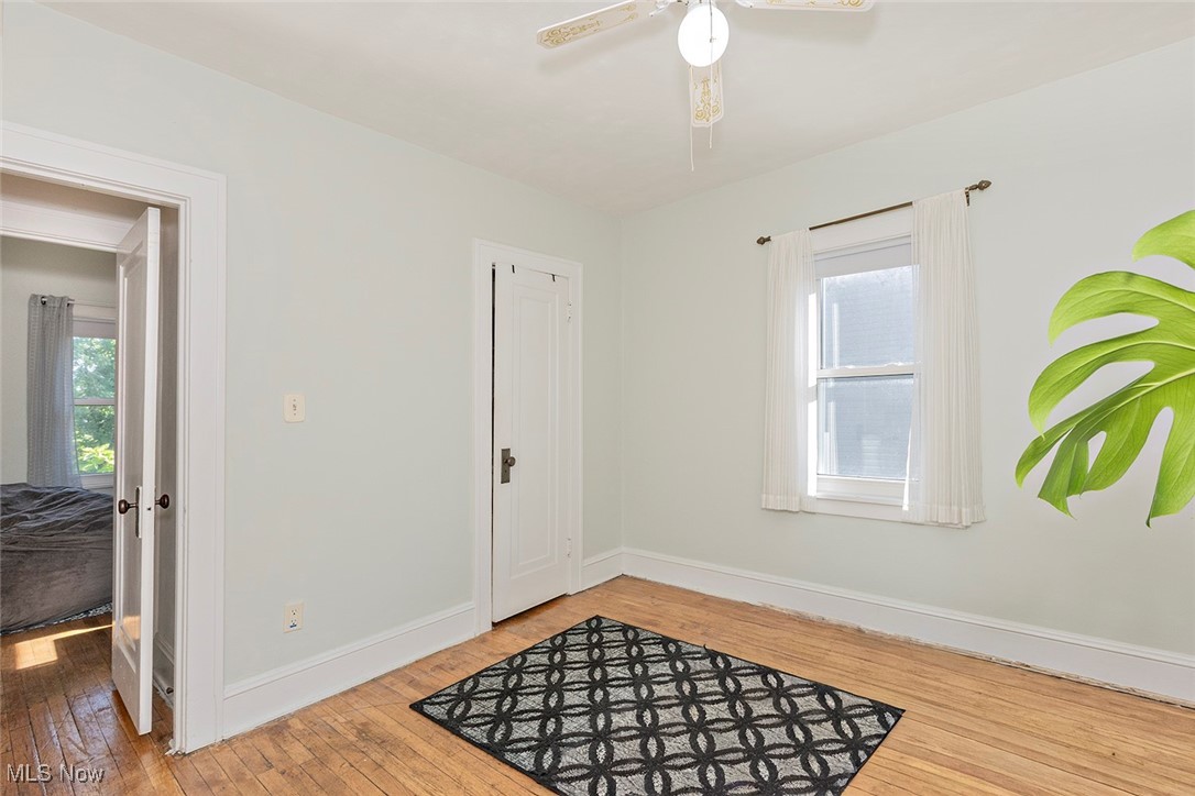 3573 Silsby Road Cleveland, OH 44118 - Photo 17 of 29 Second bedroom. Hardwood floor and ceiling fan.