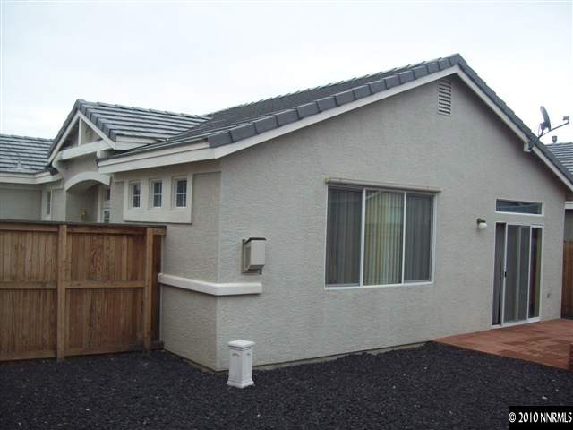 10439 Chadwell Drive Reno, NV 89521 - Photo 4 of 5 a front view of a house with balcony