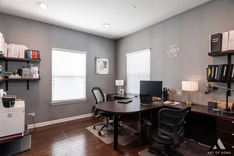 a bedroom with bed and a night stand