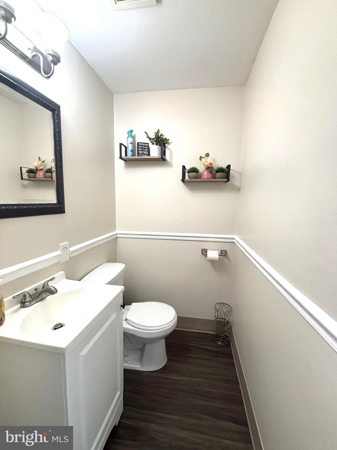 1404 St Francis Road Bel Air, MD 21014 - Photo 12 of 23 a bathroom with a sink a toilet and vanity