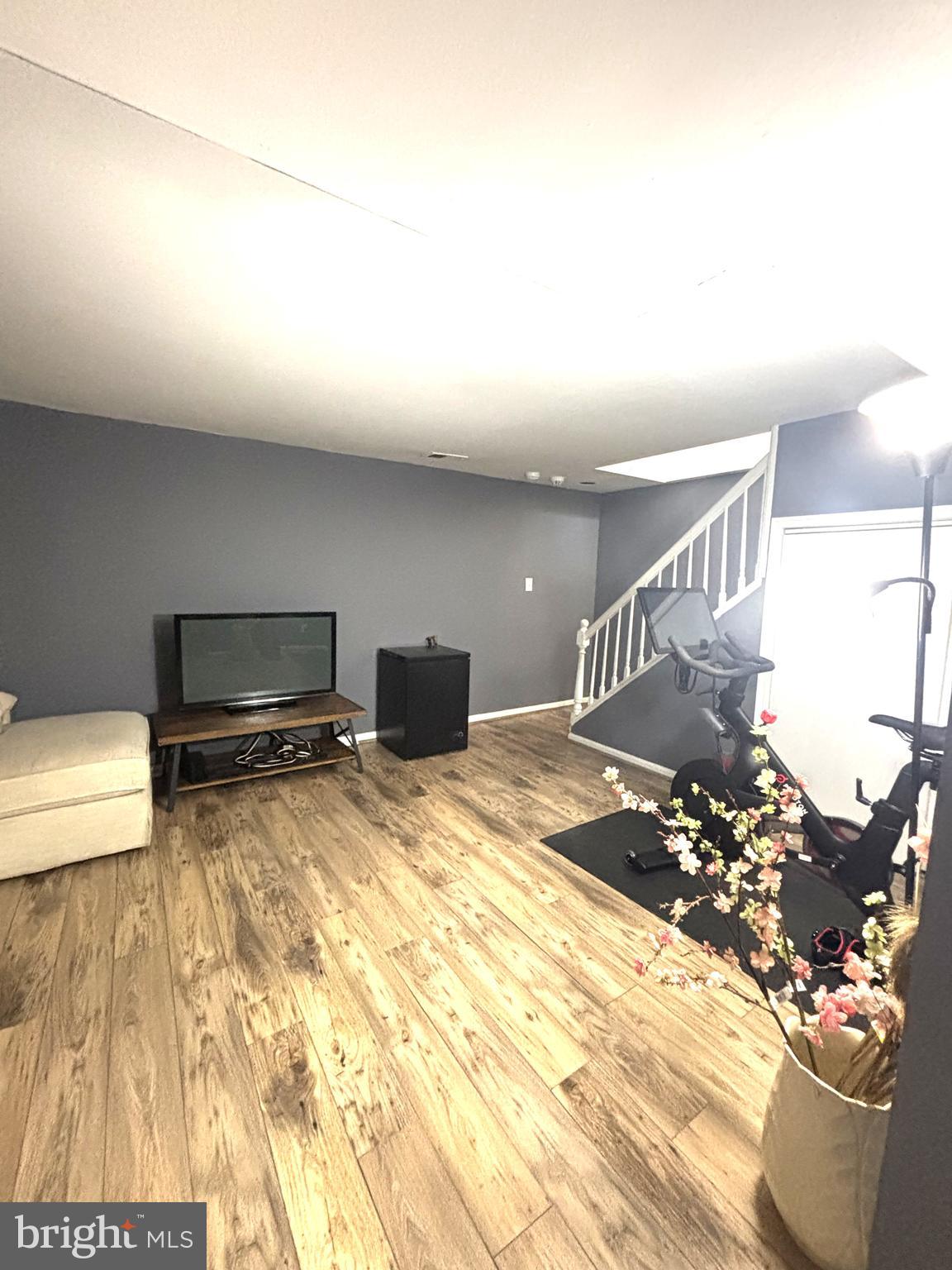 1404 St Francis Road Bel Air, MD 21014 - Photo 13 of 23 a bedroom with a bed and wooden floor