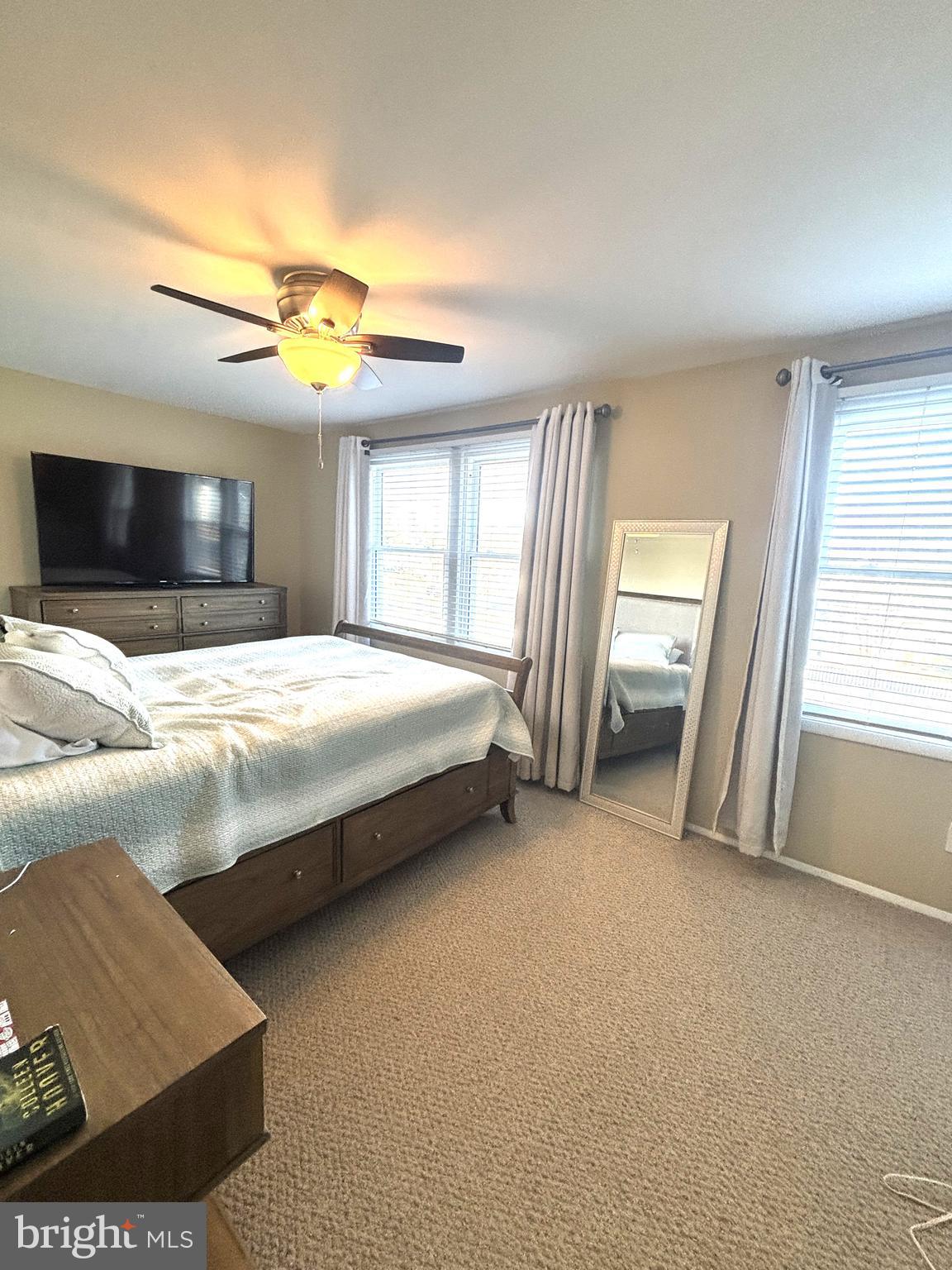 1404 St Francis Road Bel Air, MD 21014 - Photo 18 of 23 a bedroom with a bed and a chandelier