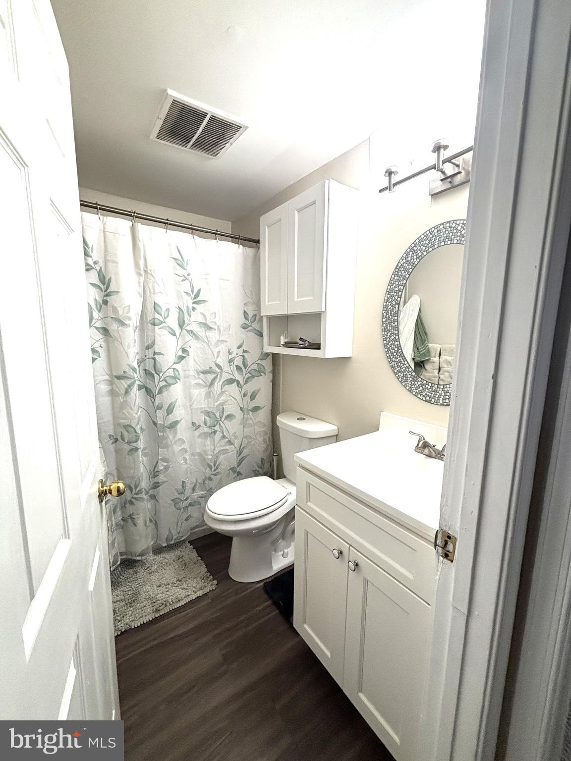 1404 St Francis Road Bel Air, MD 21014 - Photo 20 of 23 a bathroom with a toilet a sink and a shower