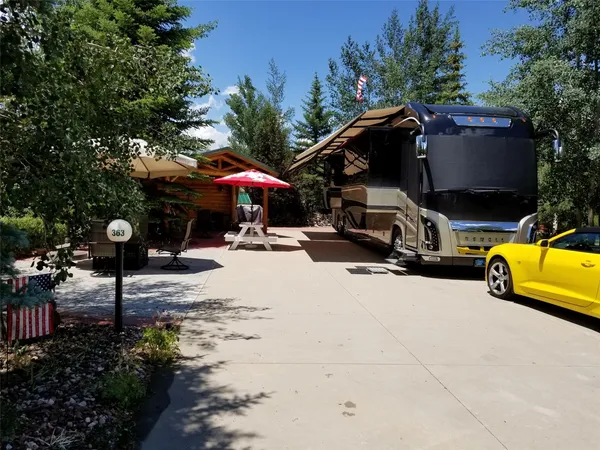 a view of a street with cars
