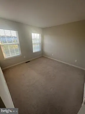 a bathroom with a sink a mirror and a shower