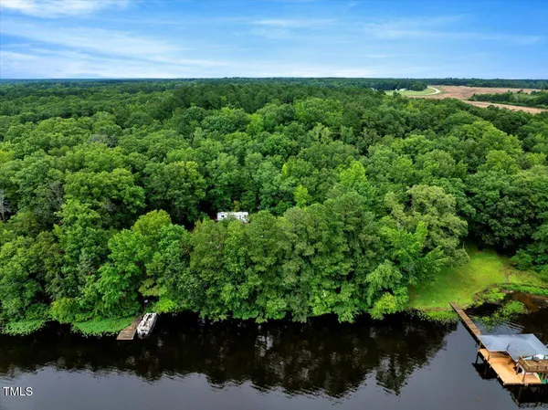 a view of a lake with a yard