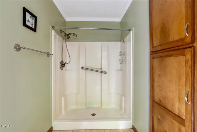 a view of front door with wooden door