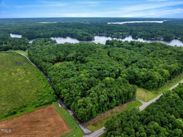 a view of a green yard with a houses