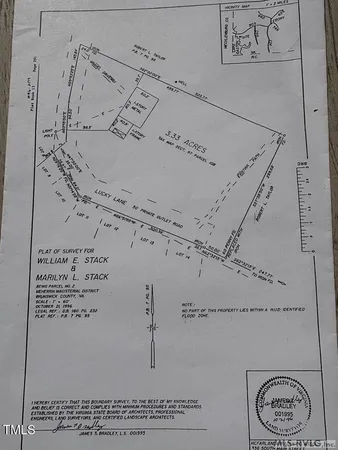 a view of a field with an trees