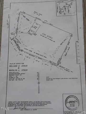 a view of a field with an trees