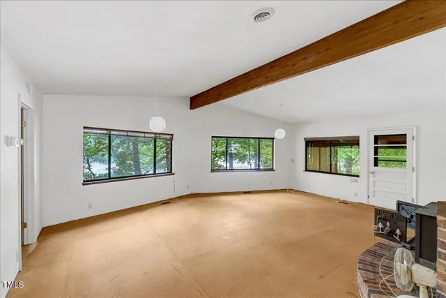 a view of livingroom with furniture and window
