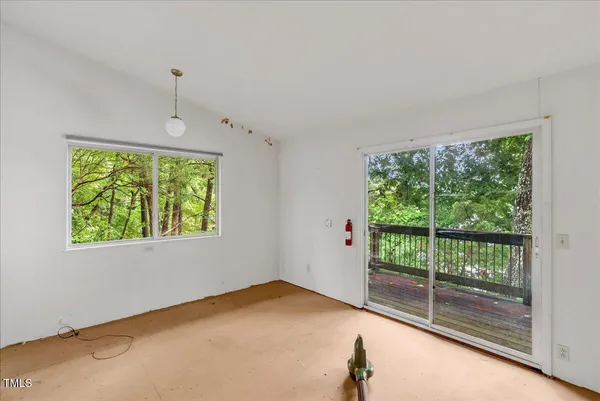 a view of a room with a large window