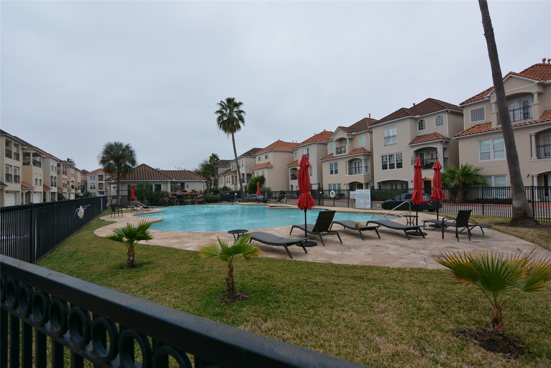 6119 Windwater Pointe Houston, TX 77036 - Photo 20 of 23 a front view of a house with garden