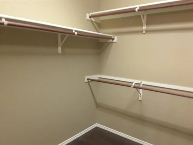 a view of a room with racks on the wall