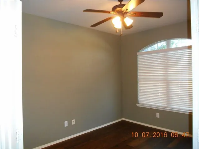 a view of a room with a window