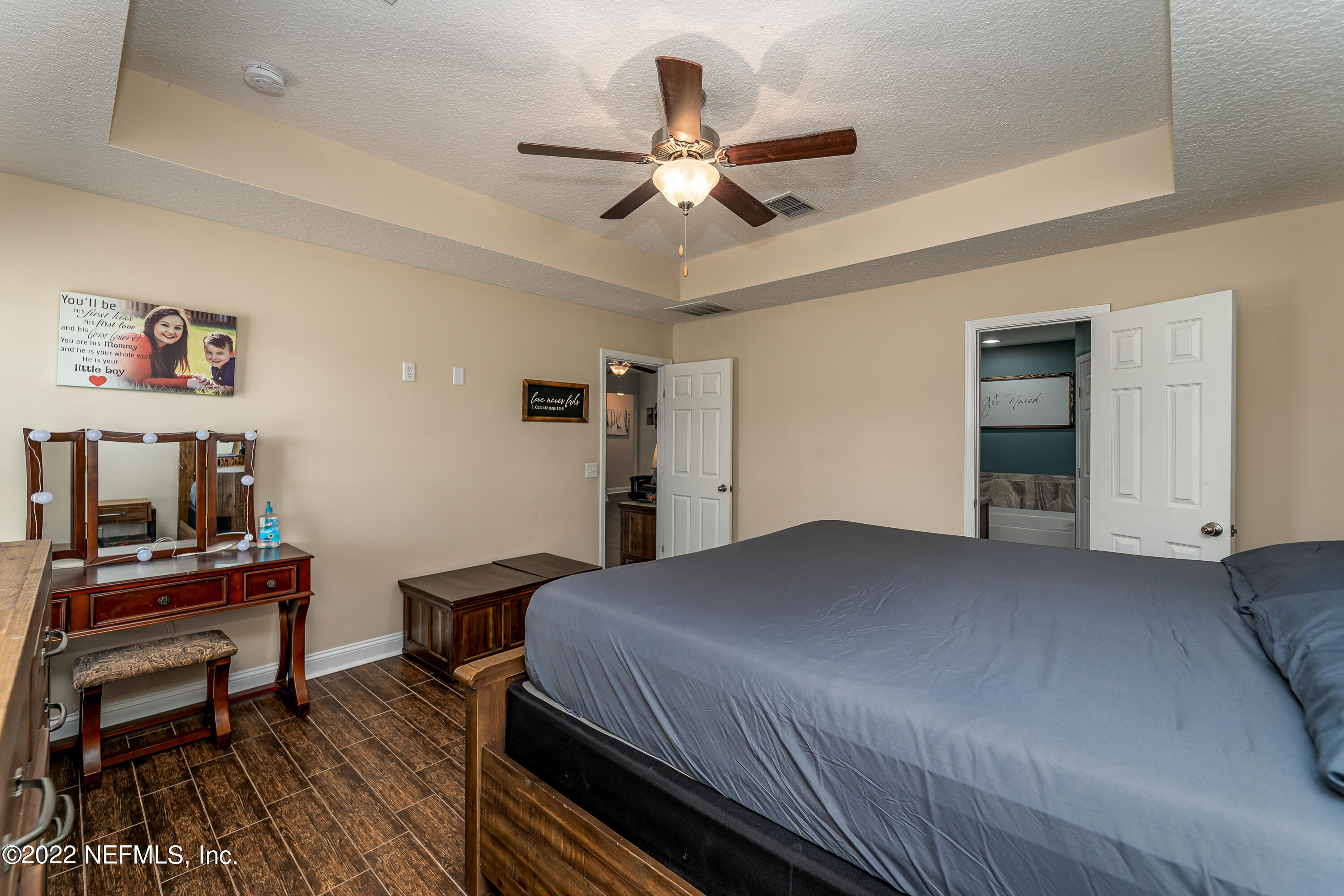9143 McClelland Road Jacksonville, FL 32234 - Photo 20 of 37 a bedroom with a bed and a desk