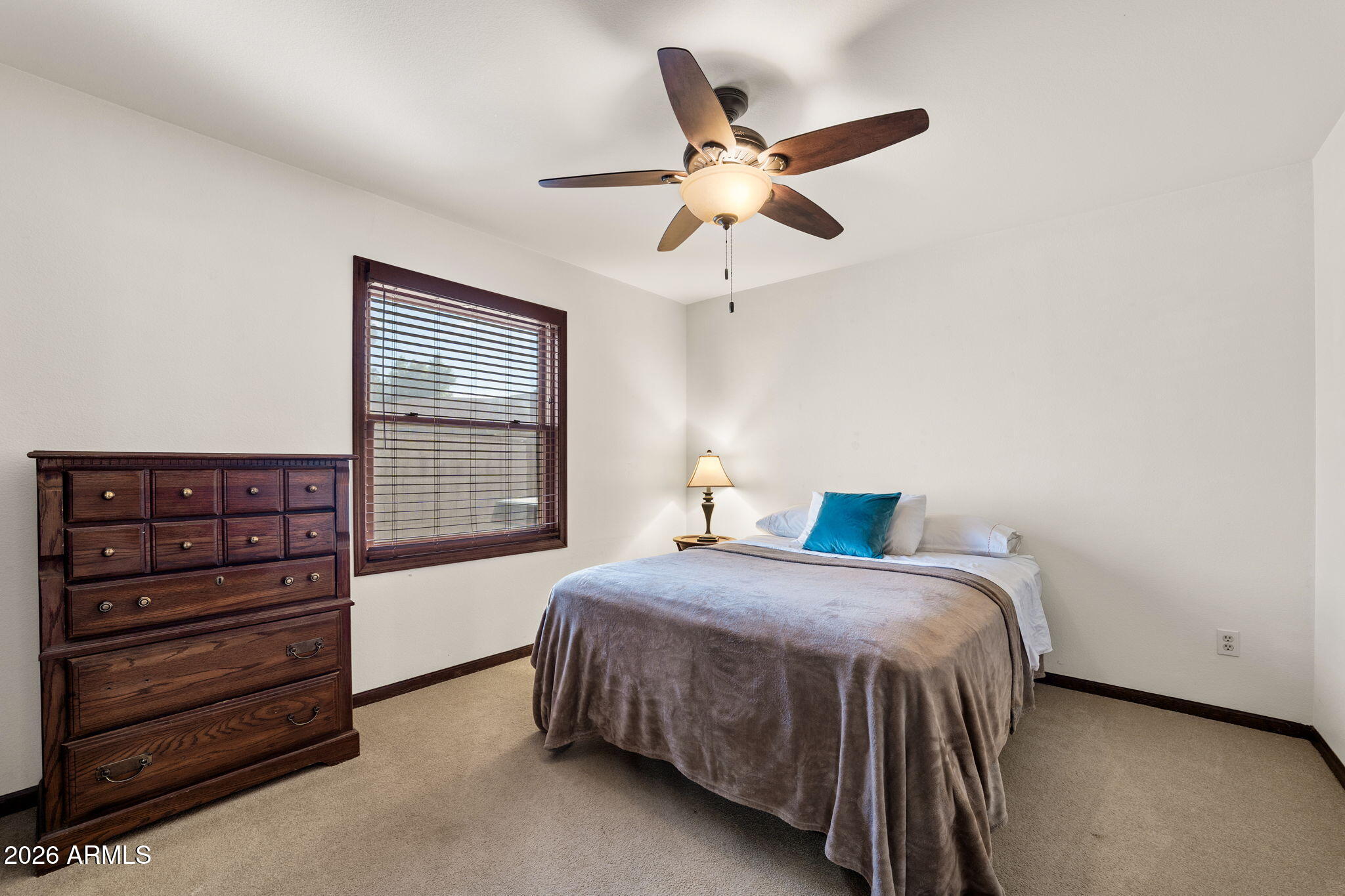 2029 East Lockwood Street Mesa, AZ 85213 - Photo 21 of 23 a bedroom with a bed and a window