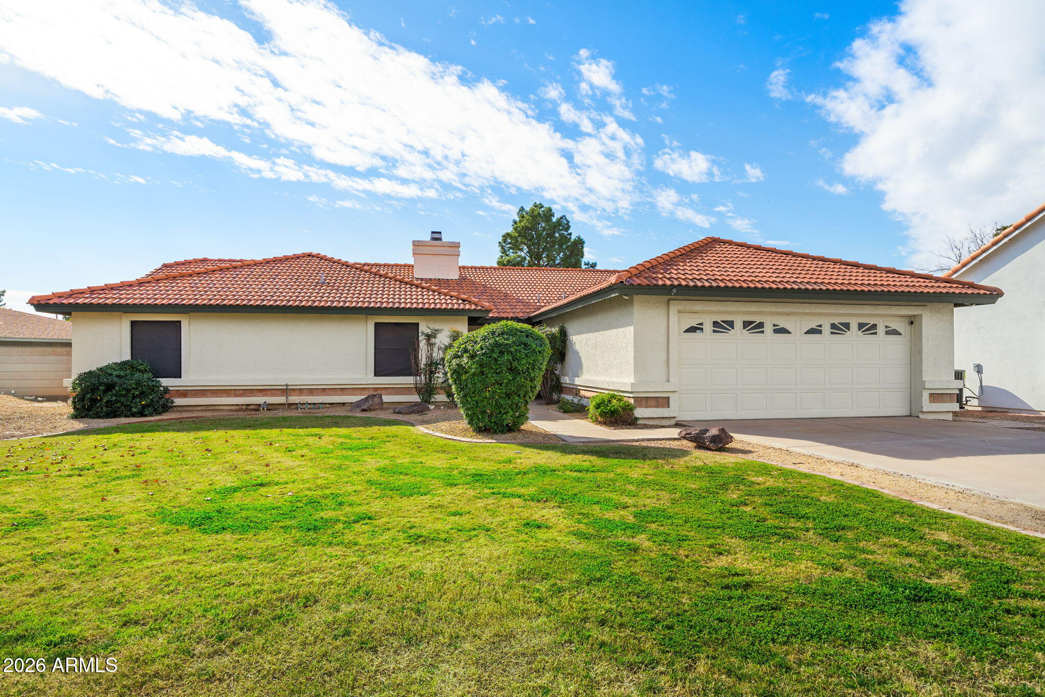 2029 East Lockwood Street Mesa, AZ 85213 - Photo 23 of 23 a view of a house with a yard and sitting area