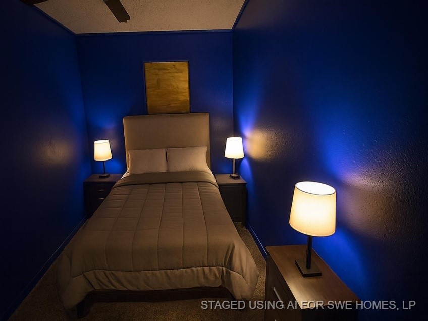 105 Lodge Street Ore City, TX 75683 - Photo 6 of 9 a bedroom with a bed and a window